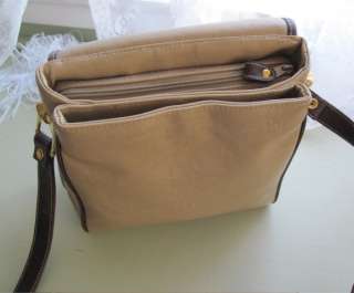The Large, Center Compartment has a Top, Zipper Closure. Inside is 