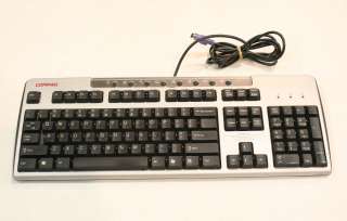   This listing is for a pre owned Compaq KB 0133 in fair condition