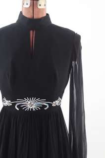 Beautiful very early 1960s party dress. The body of the dress is a 