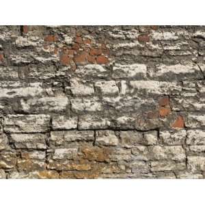  Close up of a Rough Brick Wall with Faded White Paint 