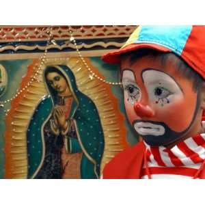  Young Clown, Bolillito, Stands Next to an Image of the Virgin 