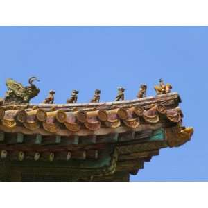 , Beijing, Forbidden City, Sculptures of Guarding Animals on Upturned 
