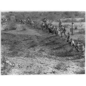   1914 skirmish line of Mayan Indians with bows,arrows