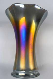   GLASS of this gorgeous vase really produces wonderful iridescence