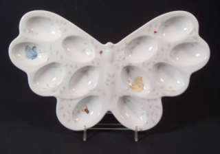 Butterfly shaped tray holds a dozen (12) deviled eggs; on its wings 