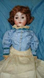   Doll 24 Victorian Dress Bisque Head wood body blue glass eyes  