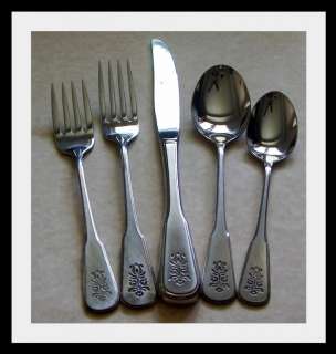   wear from previous use. Place setting includes the following pieces