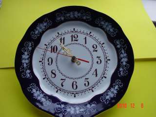   PORCELAIN WALL CLOCK it is HAND PAINTED and made in Hungary   NEW