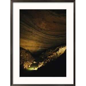  Man Stands in a Cave Chamber in Rumbling Falls Cave System 