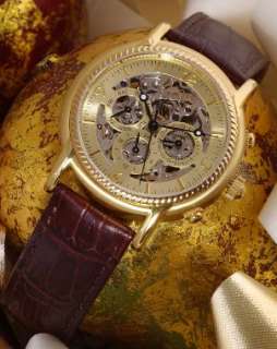 Gold Bulova watch with a leather watchband