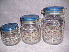 Vintage Made in Japan Three Piece Blue Trimmed Glass Canister Set