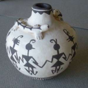 Acoma black and white pot w/ sculpted lizard and turtle  