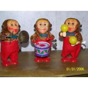DANCING MONKEY(S) W/CYMBOLS OR DRUMS OR SHAKERS   WINDS UP & DANCES