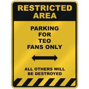  RESTRICTED AREA  PARKING FOR TEO FANS ONLY  PARKING SIGN 