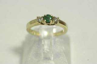 Ladies 14 Karat Yellow Gold Emerald and Diamond Ring  