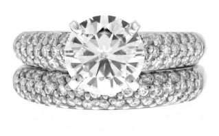 GORGEOUS PAVÉ DIAMONDS ADORN A FIERY MOISSANITE JEWEL IN OUR 