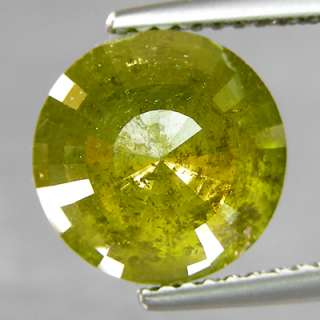  greenish yellow clarity opaque comment the diamond has been treated 