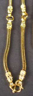 This 22 K yellow gold dipped snake chain is to hold 3 Buddha amulets 