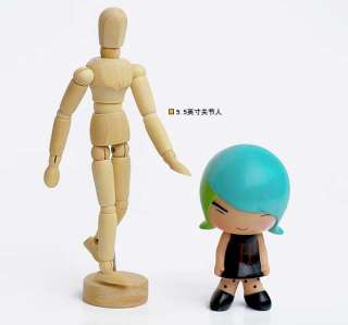 it is a 14cm tall wooden child models its design according proportion 