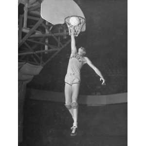  Texas A&M Basketball Player Bob Kurland Reaching to Make a 