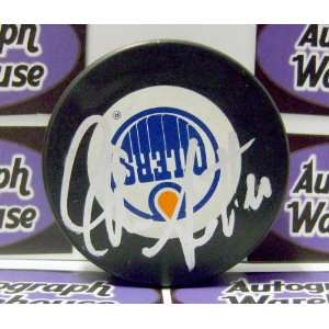 Glen Sather Autographed Puck   upside down  Sports 