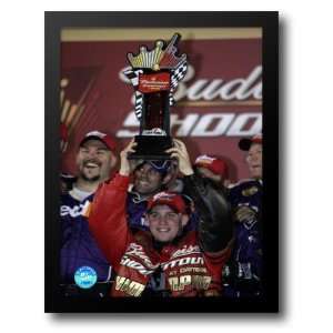  Denny Hamlin in victory lane at Budweiser Shootout holding 
