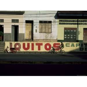  Bicycle Cruises Past Homes, Iquitos, Peru, South America 