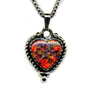 Red Fire Opal heart shape stone 10 mm across, set in a beautiful 