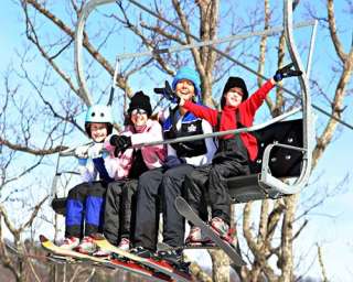  can enjoy sliding on snow at the Peaked Mountain Express Tube 