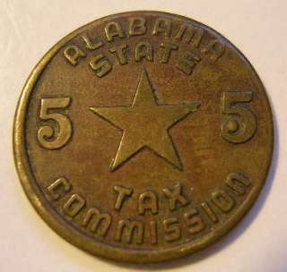 This vintage tax token is from Alabama State Tax Commission Luxury Tax 